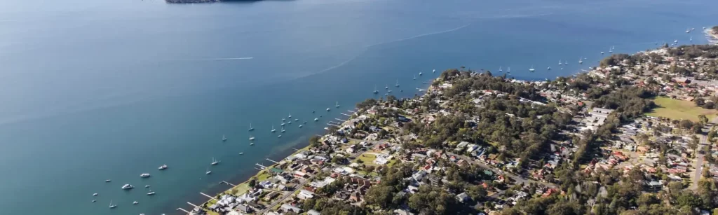 A coastal suburb featuring numerous houses