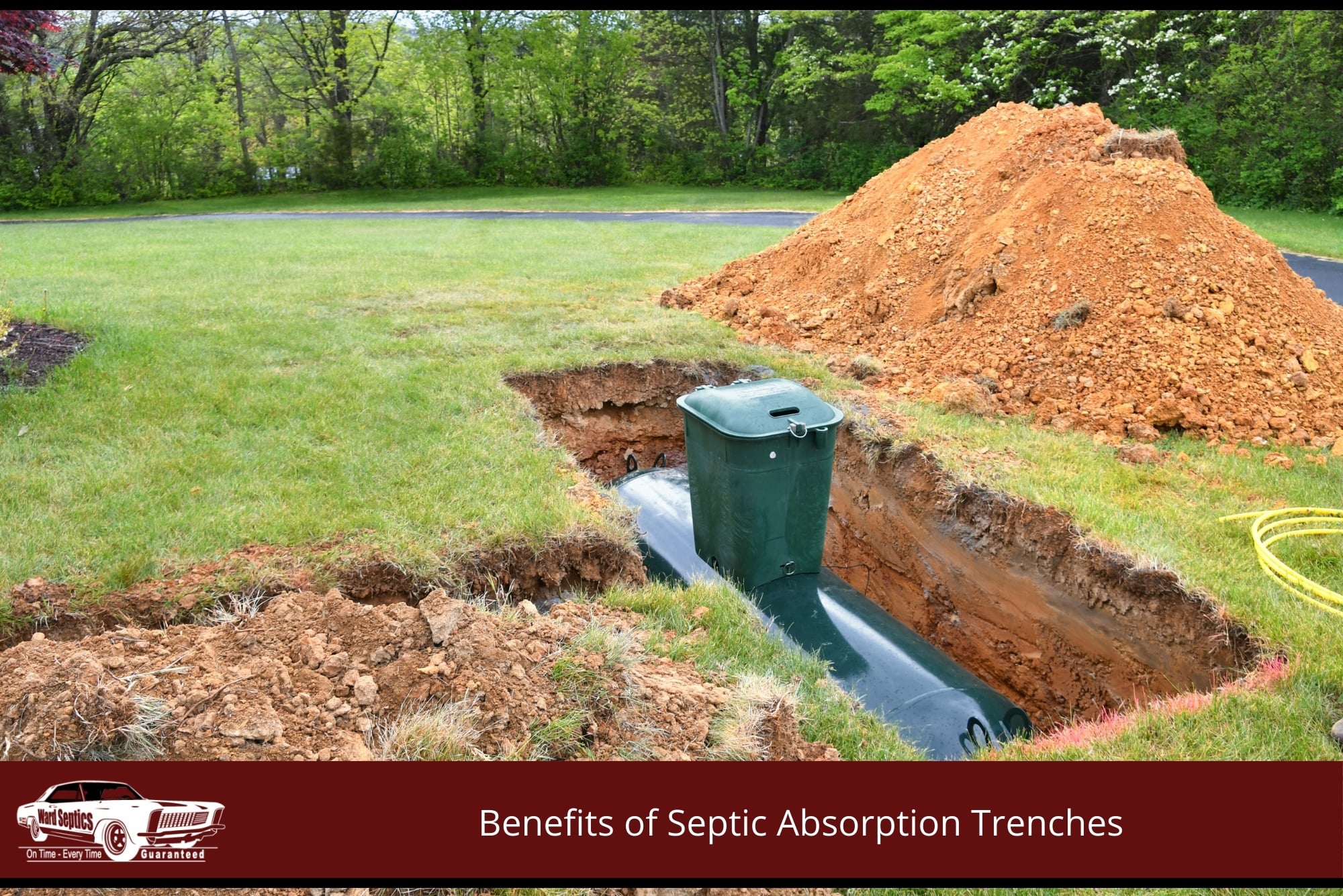 green septic in an open field with a pile of soil on the side
