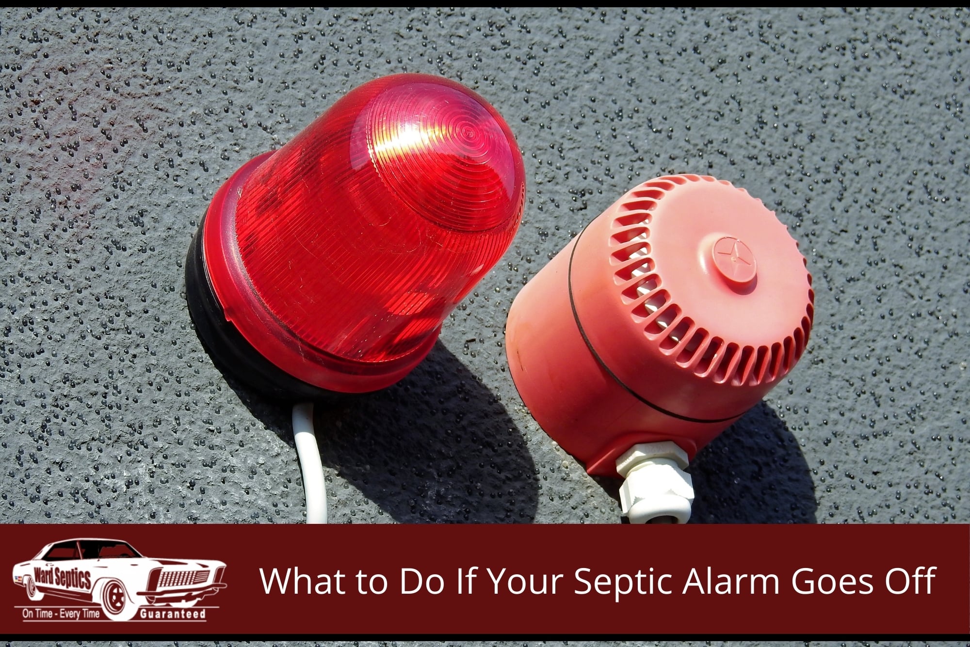 An outdoor septic alarm system mounted on a textured wall.