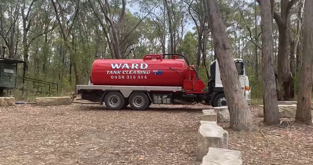Ward Septics completing a septic cleaning job for National Parks at the Mogo camp site in Bucketty.